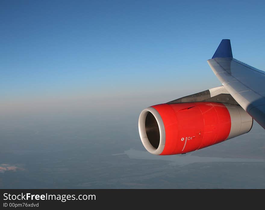 Engine of an aircraft in the sky. Engine of an aircraft in the sky