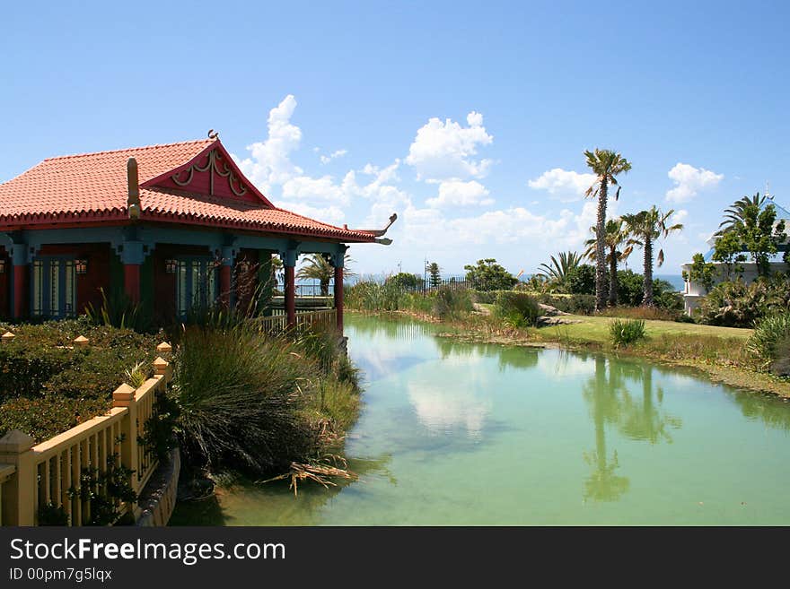 Oriental building at a water front showing off typical style of building and architecture