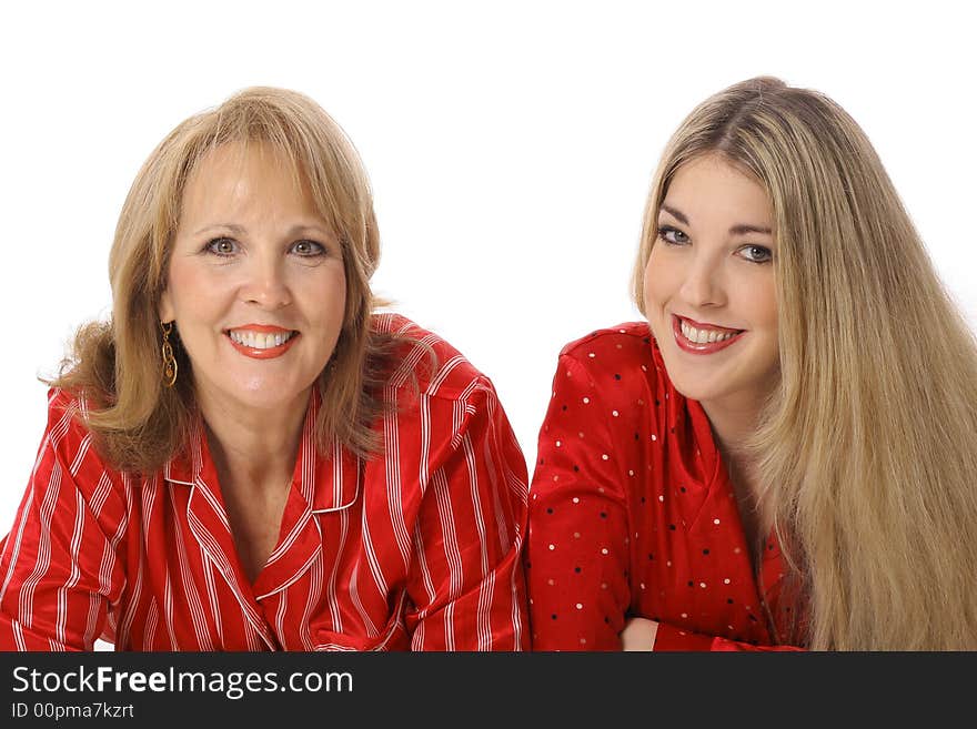 Mother and daughter laying down isolated on white