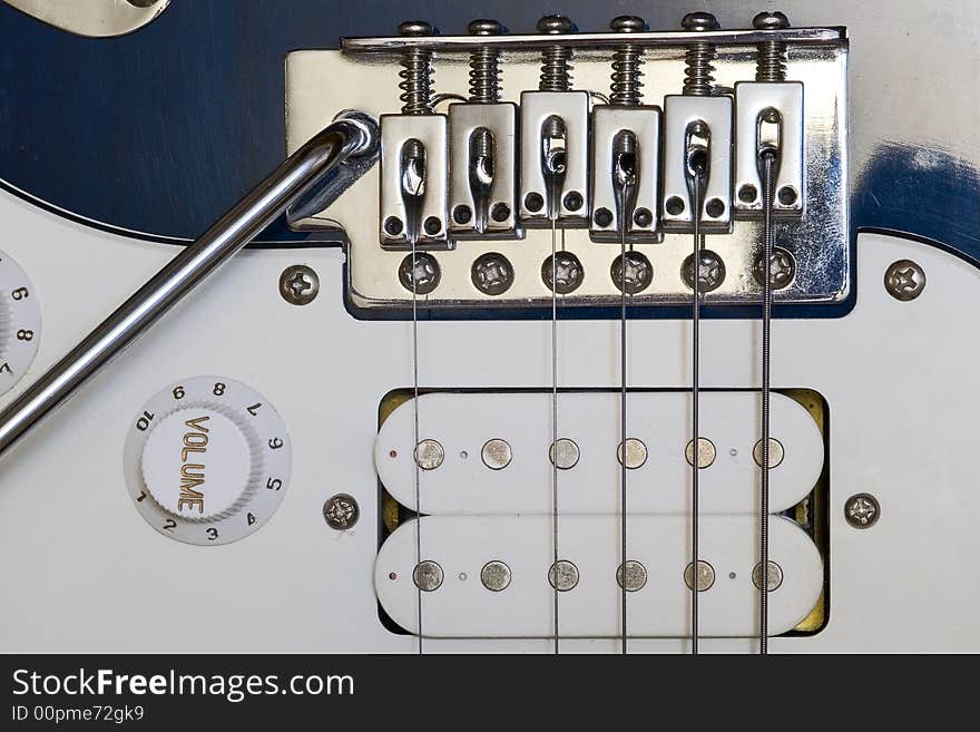 Macro shot of an electric guitar with breaked off string