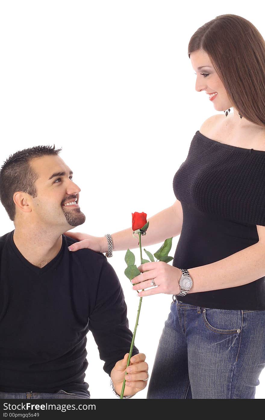 Woman receiving a rose isolated on white