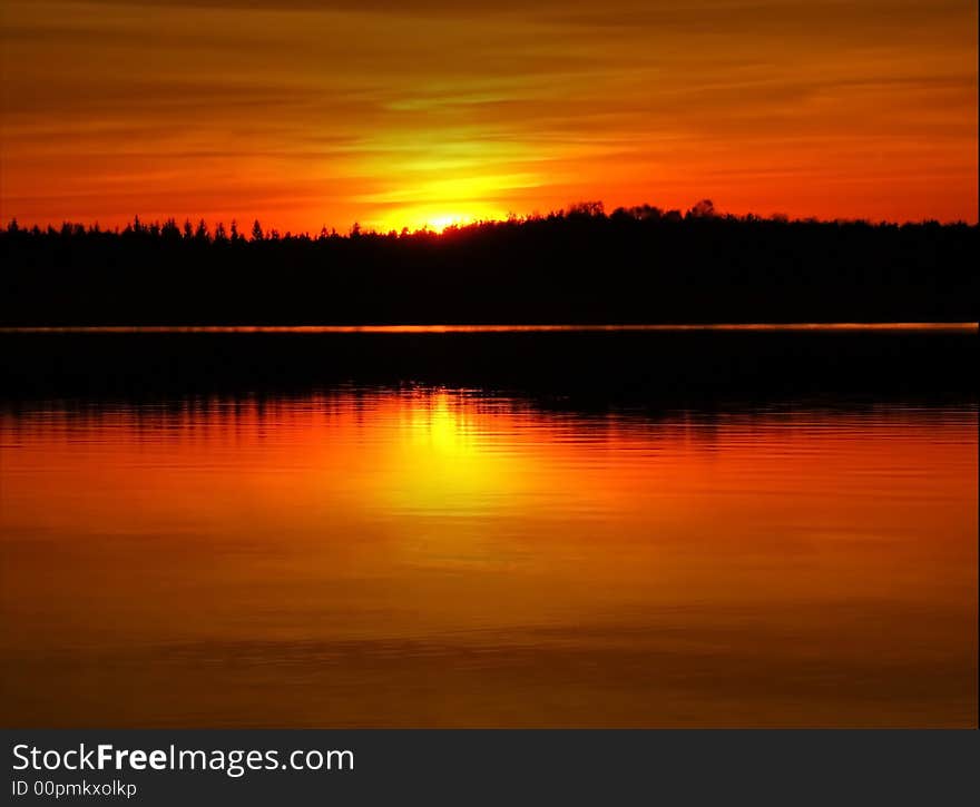 Colorful sunset and reflection in the water. Colorful sunset and reflection in the water