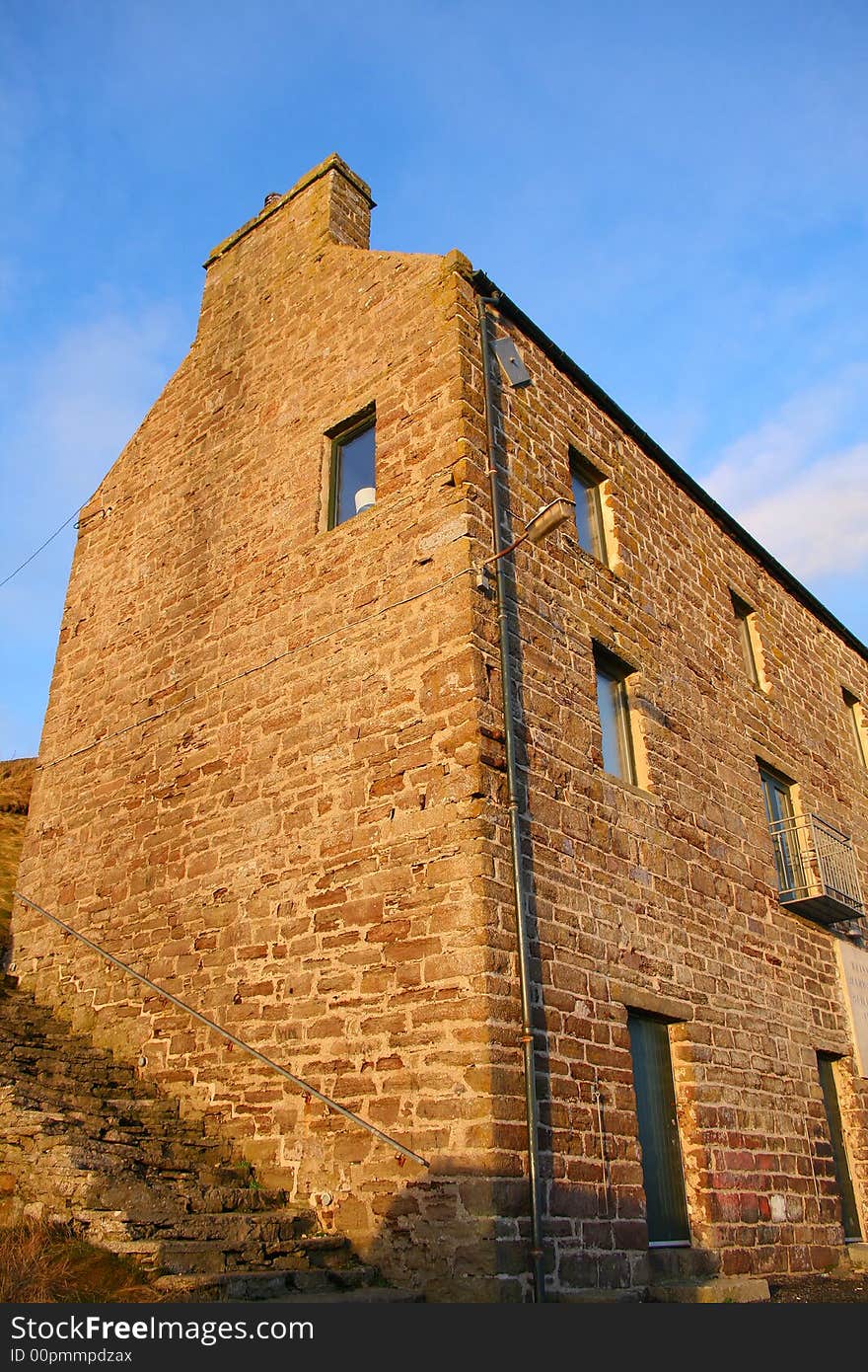 An old harbour side building converted and used as modern flats. An old harbour side building converted and used as modern flats.