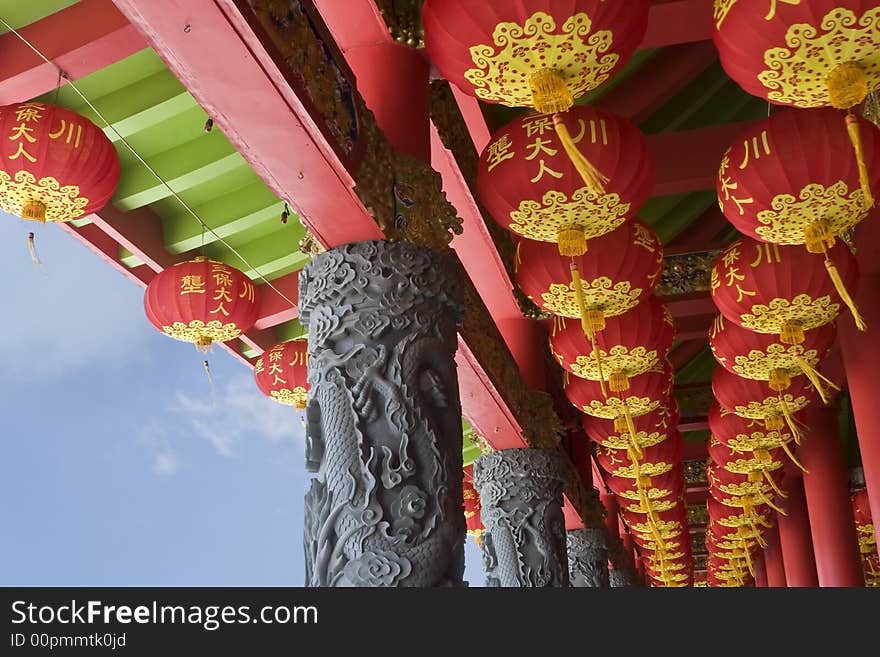 Low angle shot of chinese paper lantern inside buddha temple