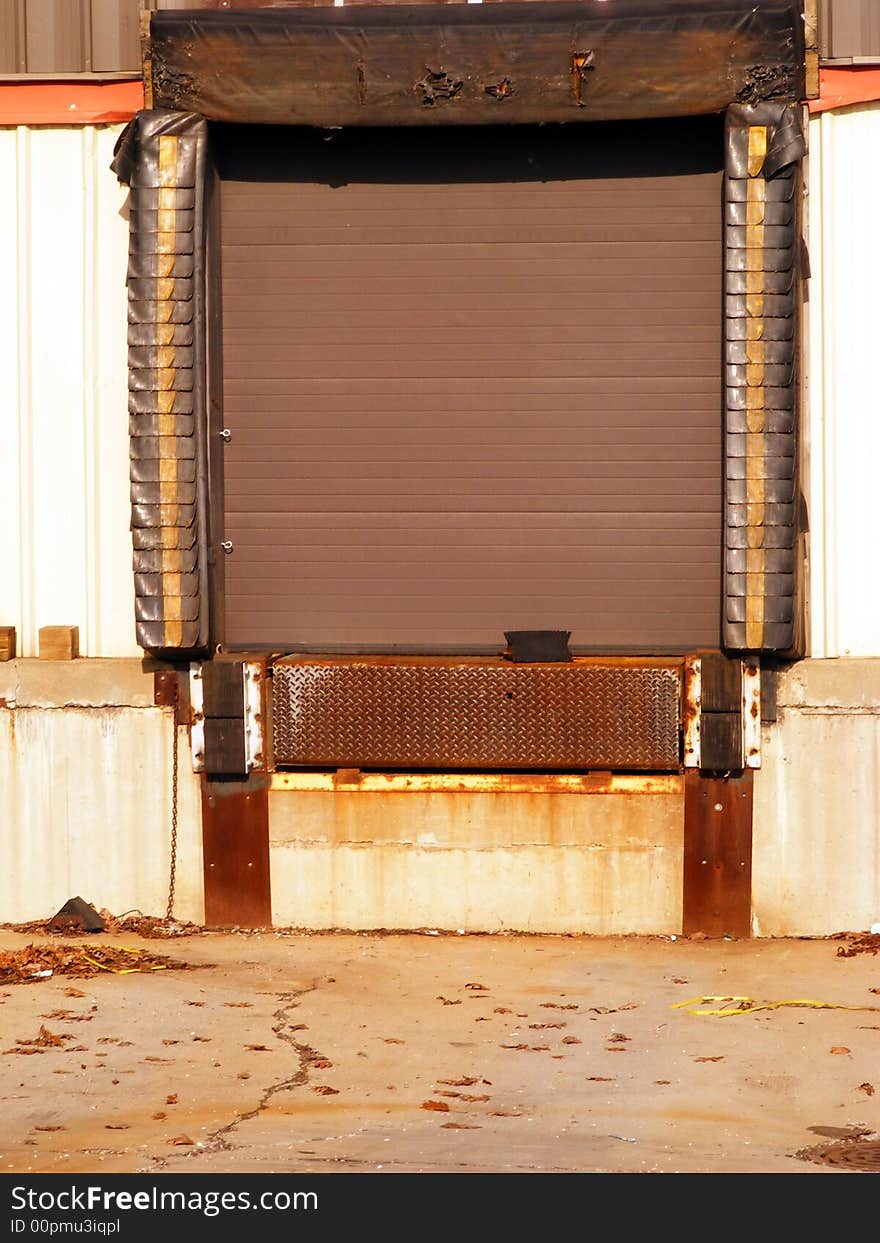 Exterior loading dock door for the loading and unloading of shipping trailers and containers.