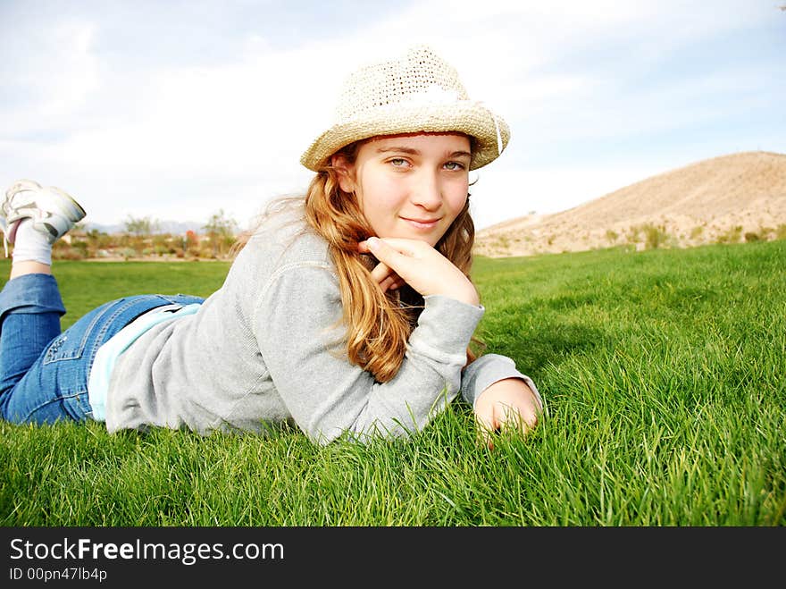 Young girl is enjoying herself at outdoor location