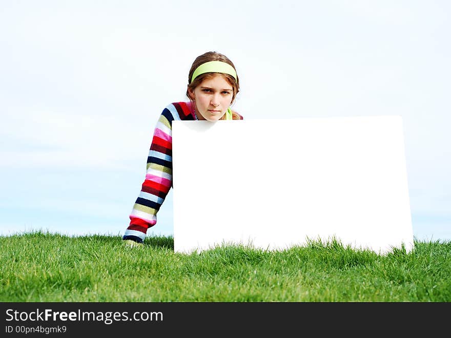 Young Girl Holding Blank Sign