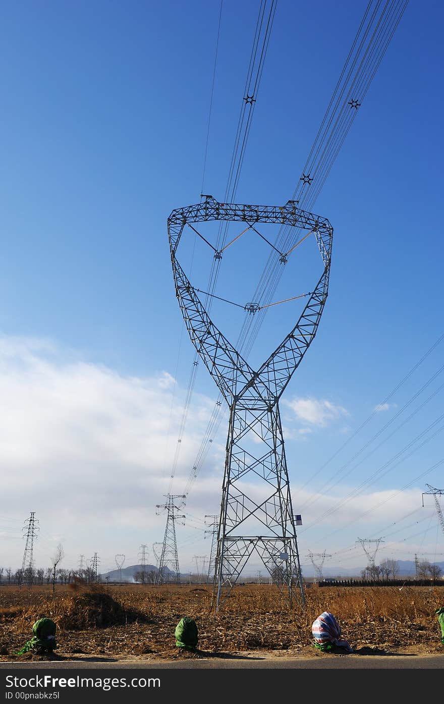 Electric power lines on farm field