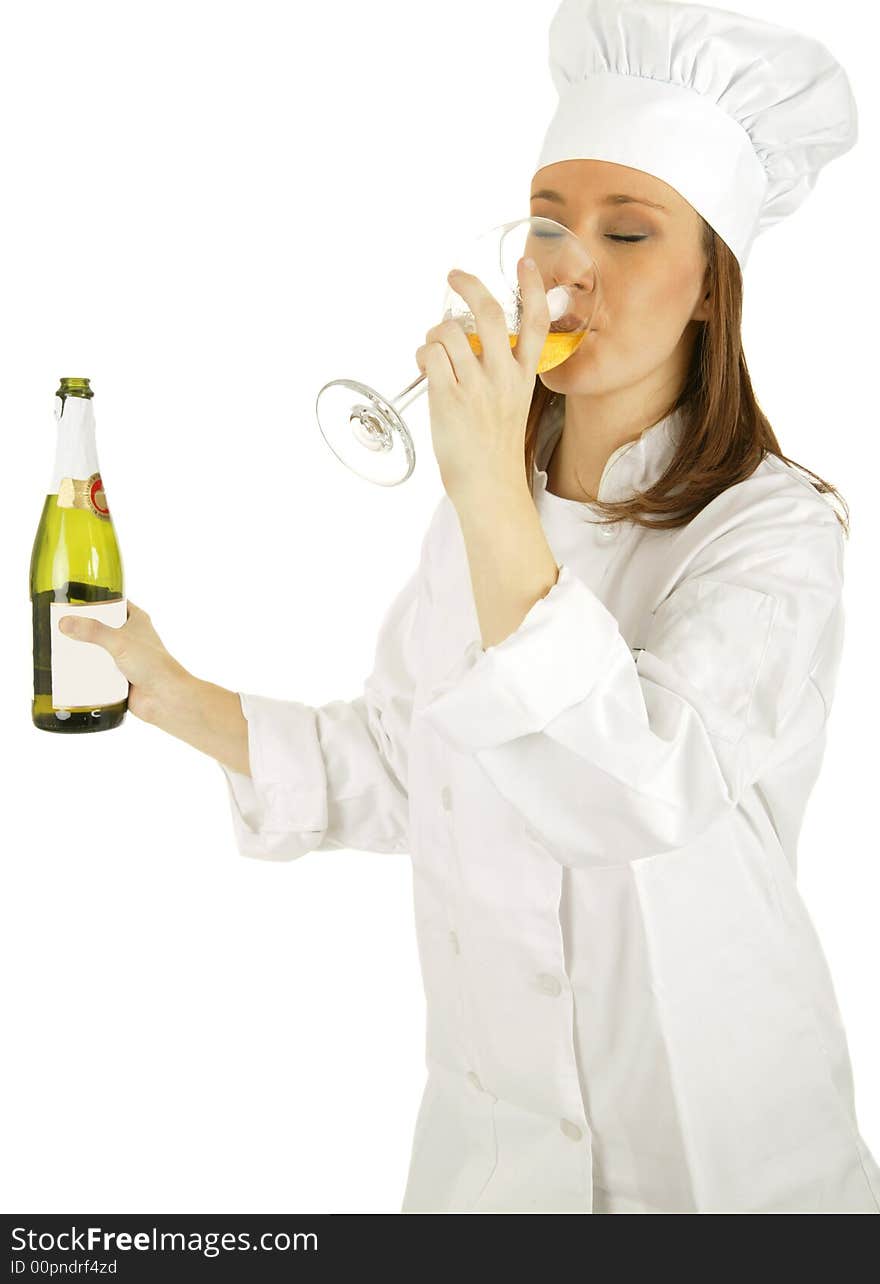 Chef drinking champagne and holding champagne bottle