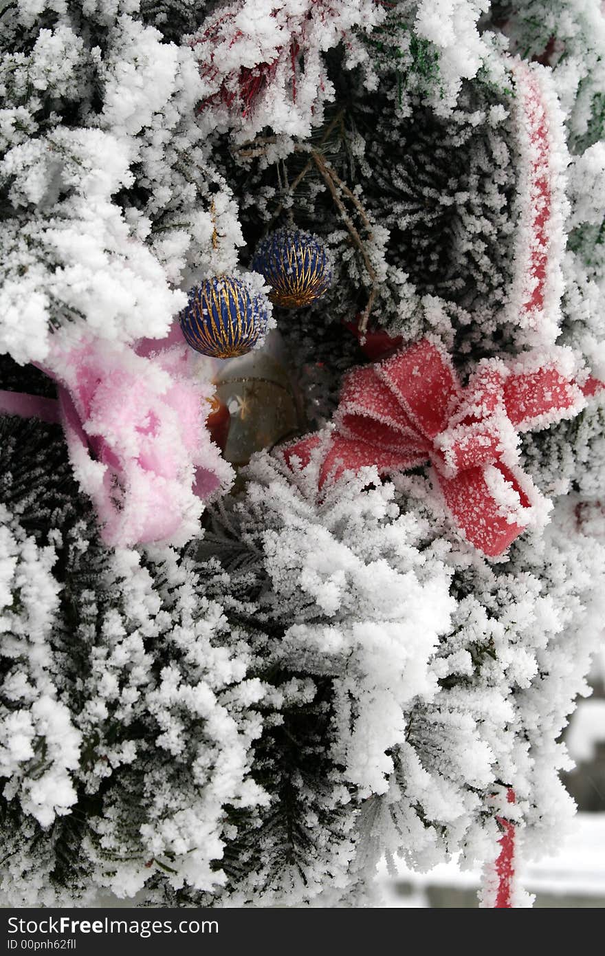 Christmas decorations covered by snow. Christmas decorations covered by snow