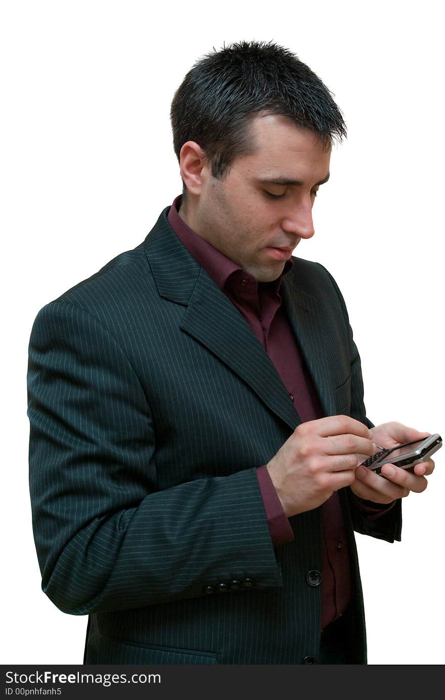 Young businessman typing with a stylus on a touchscreen mobile phone isolated on white background. Young businessman typing with a stylus on a touchscreen mobile phone isolated on white background