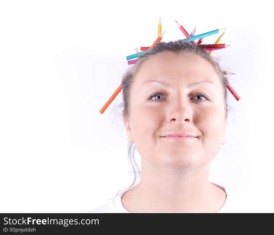 Woman with crayons in hair. Woman with crayons in hair