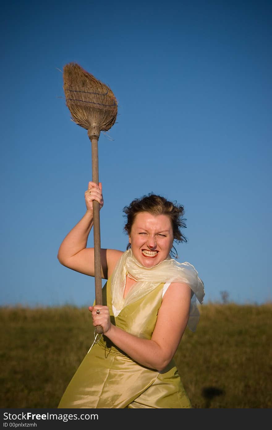 Witch hiting with broom