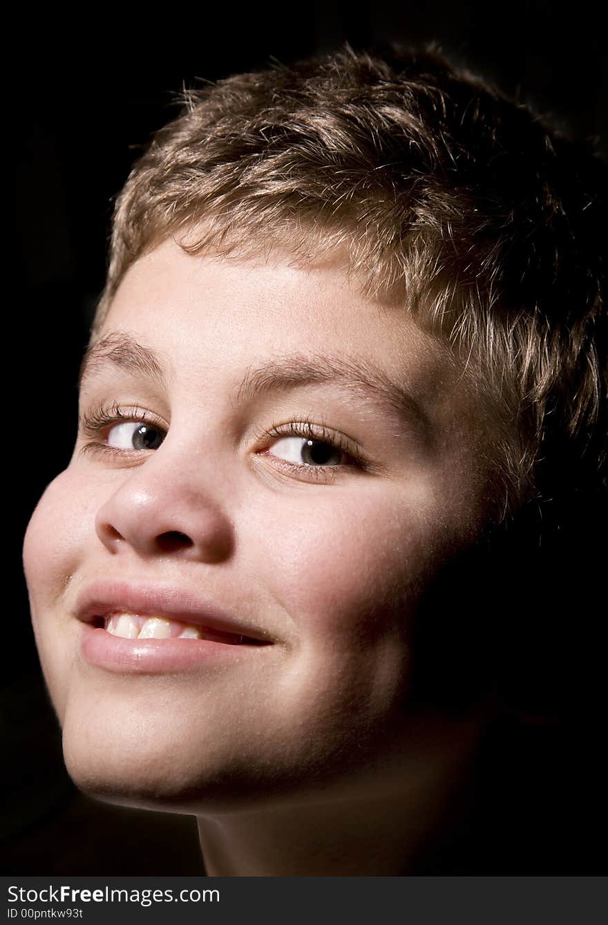 High key portrait of a young boy smiling. See my portfolio for more from this model. High key portrait of a young boy smiling. See my portfolio for more from this model.