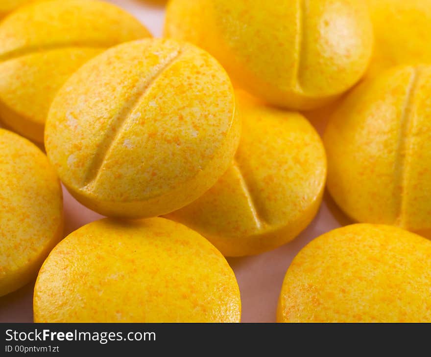 Macro shot of a small pile of vitamins