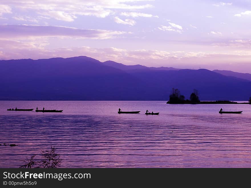 Some boats come back in dusk. Some boats come back in dusk