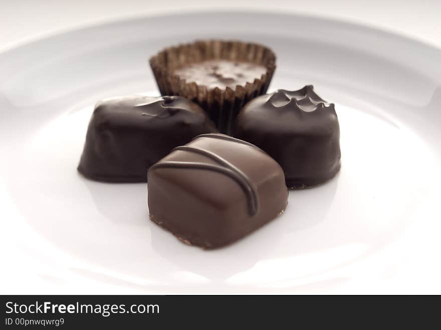 A closeup of some chocolates on a white plate.
Suitable for Valentines Day topics, birthday topics, anniversary topics. A closeup of some chocolates on a white plate.
Suitable for Valentines Day topics, birthday topics, anniversary topics