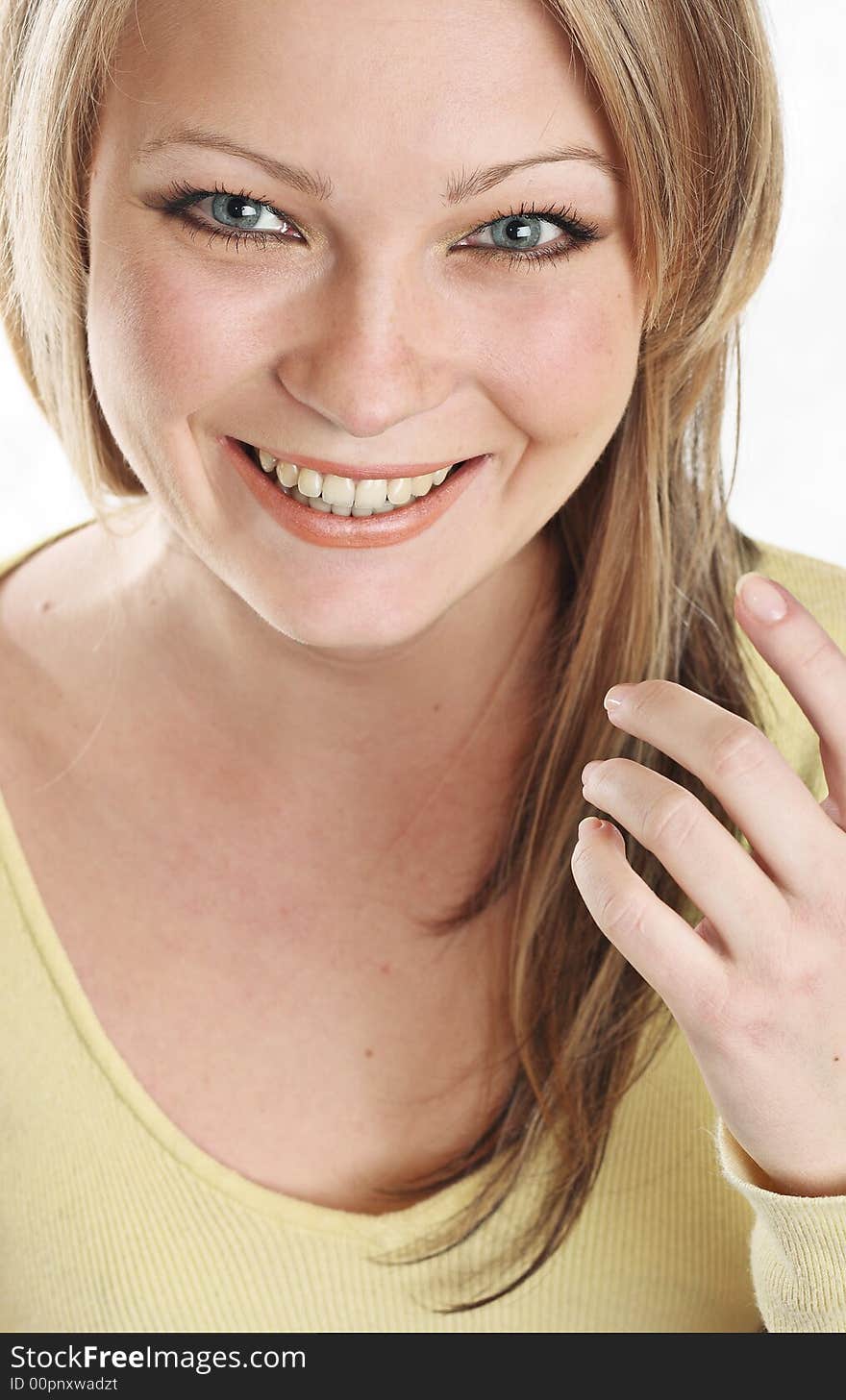 The portrait of the beautiful girl on white background. The portrait of the beautiful girl on white background