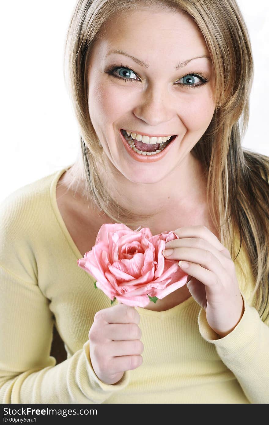 The portrait of the beautiful girl on white background with flower