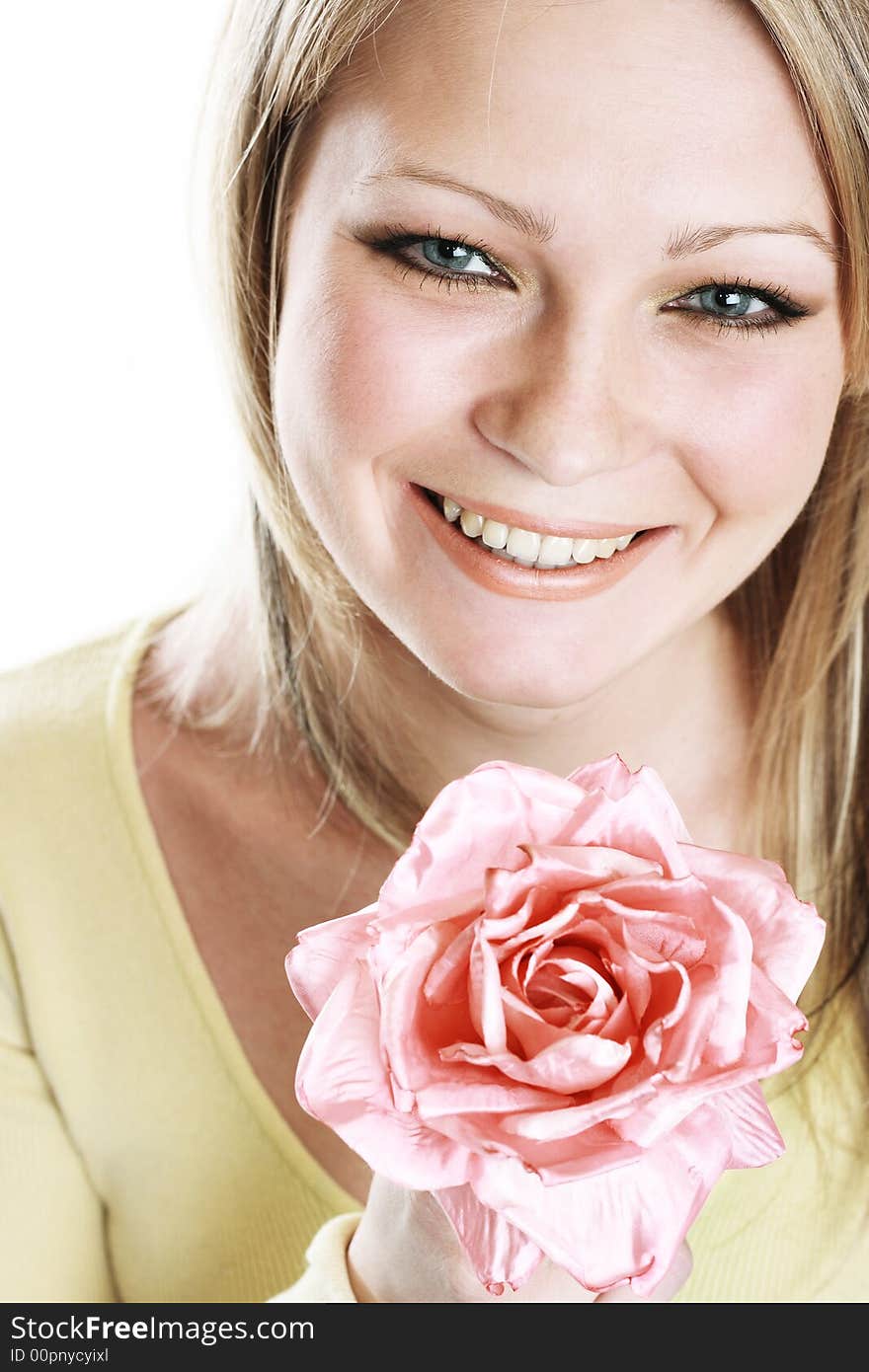 The portrait of the beautiful girl on white background with flower