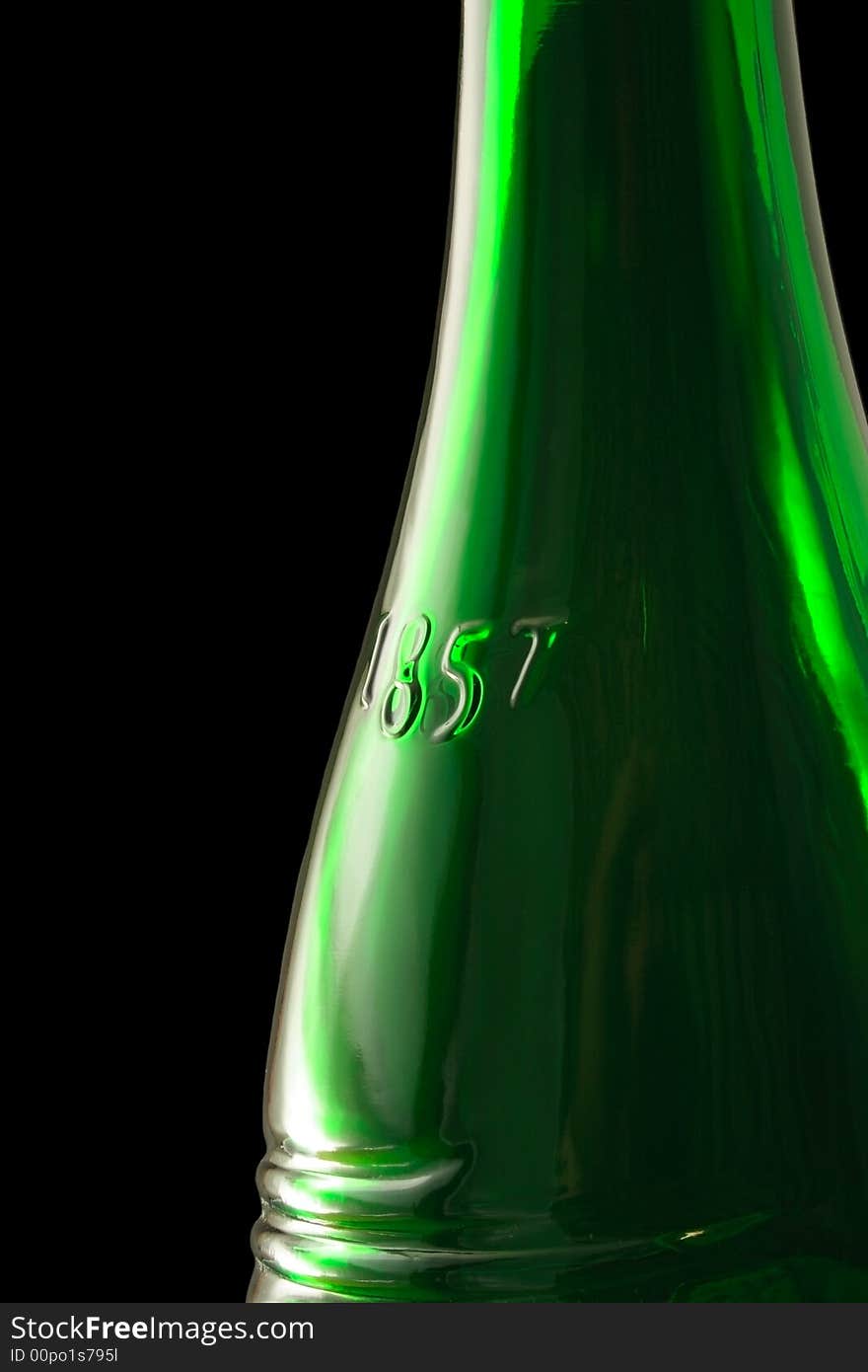 Middle part of green wine bottle with date 1857 on it