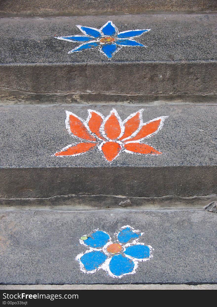 Drawings on the stairs in front of  a home in tamil nadu, india. Drawings on the stairs in front of  a home in tamil nadu, india