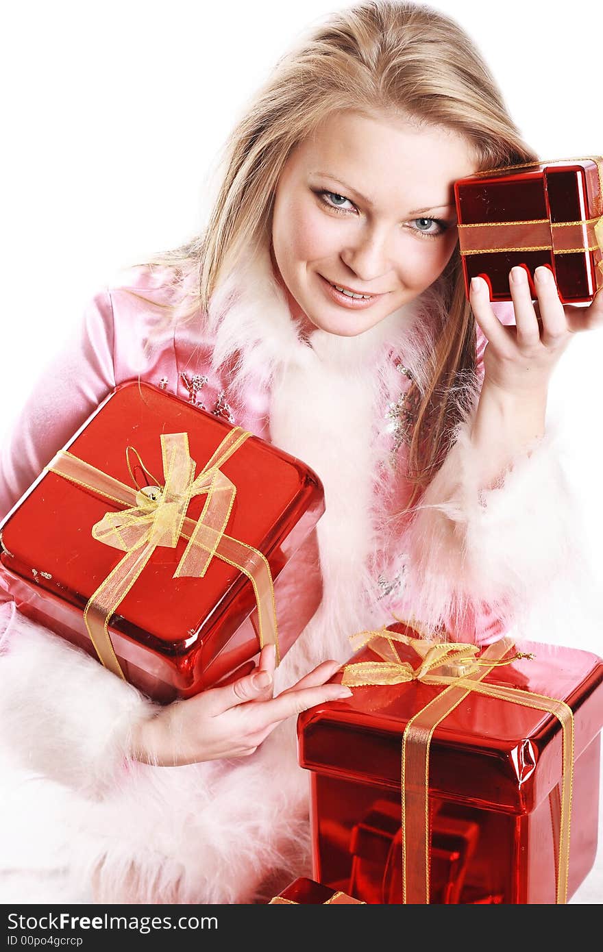 The portrait of the happy girl with gifts