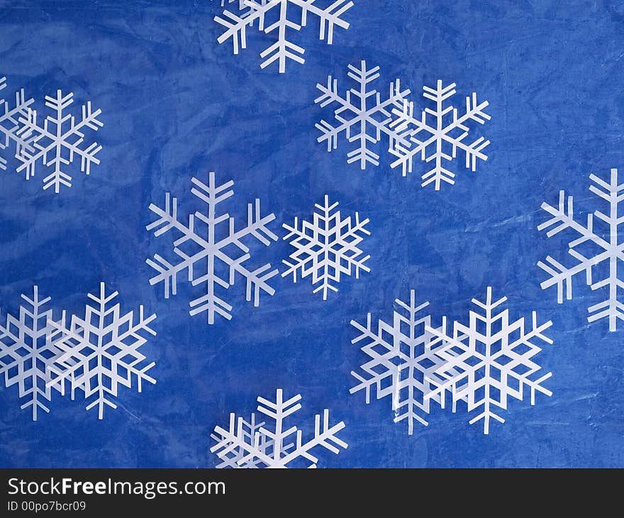 Snowflake pattern on plastic with blue background. Snowflake pattern on plastic with blue background