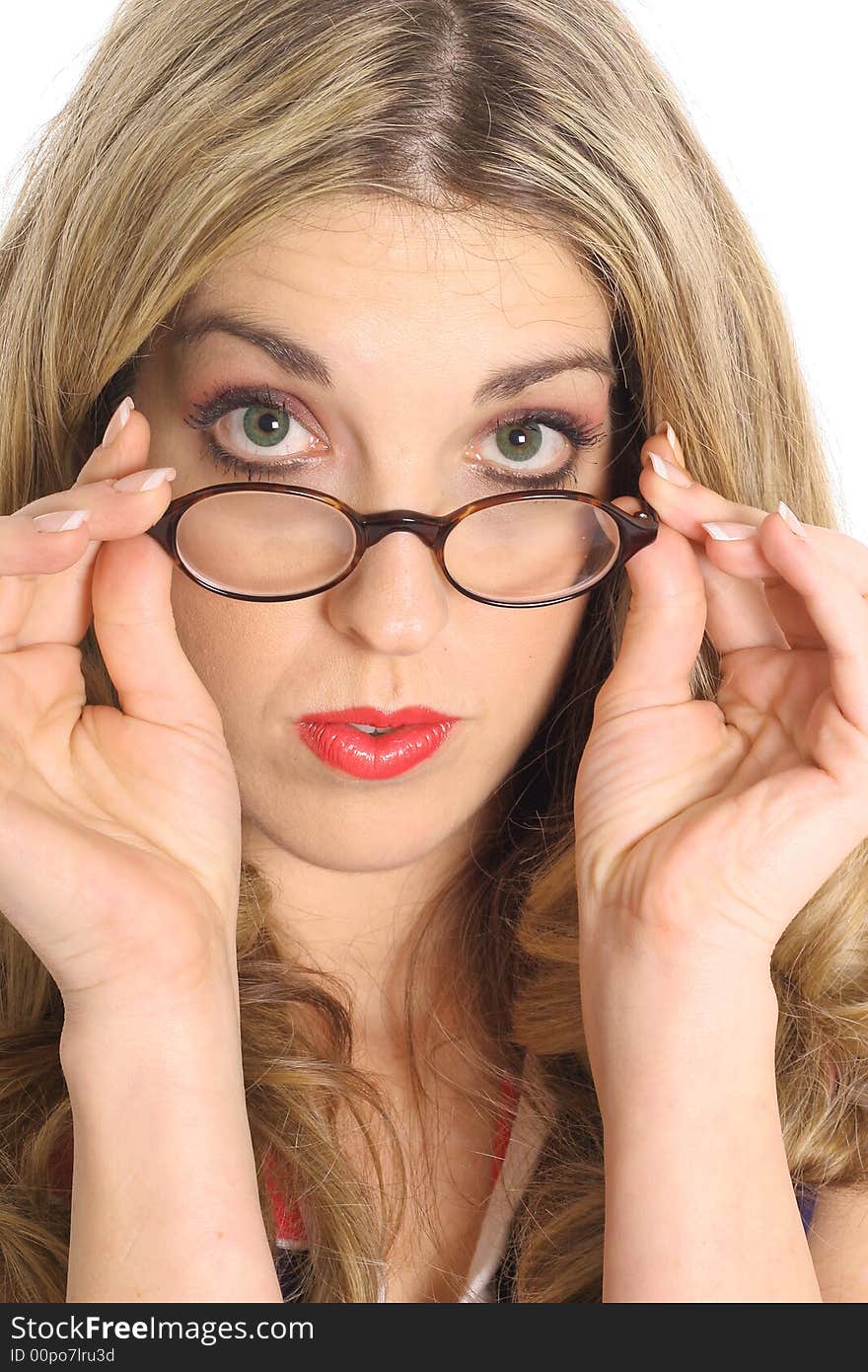 Woman pulling glasses down upclose isolated on white