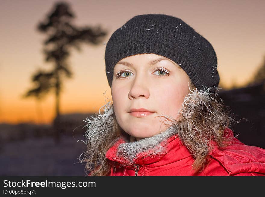 Beautiful girl with frosted eyelashes and hair. Beautiful girl with frosted eyelashes and hair