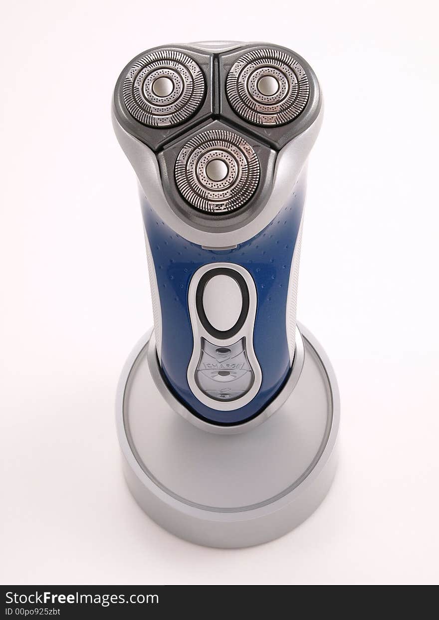 3 head electric razor with base 1