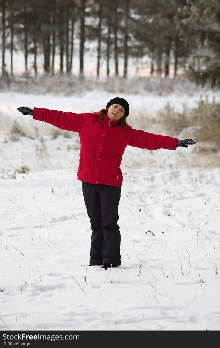 Girl in the red blazer on the white snow. Girl in the red blazer on the white snow