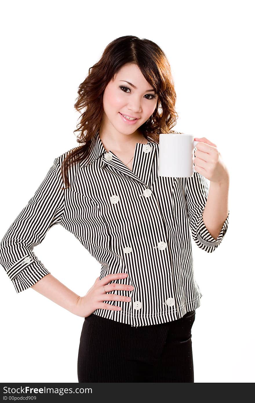 Young business woman holding a mug smiling happily. Young business woman holding a mug smiling happily