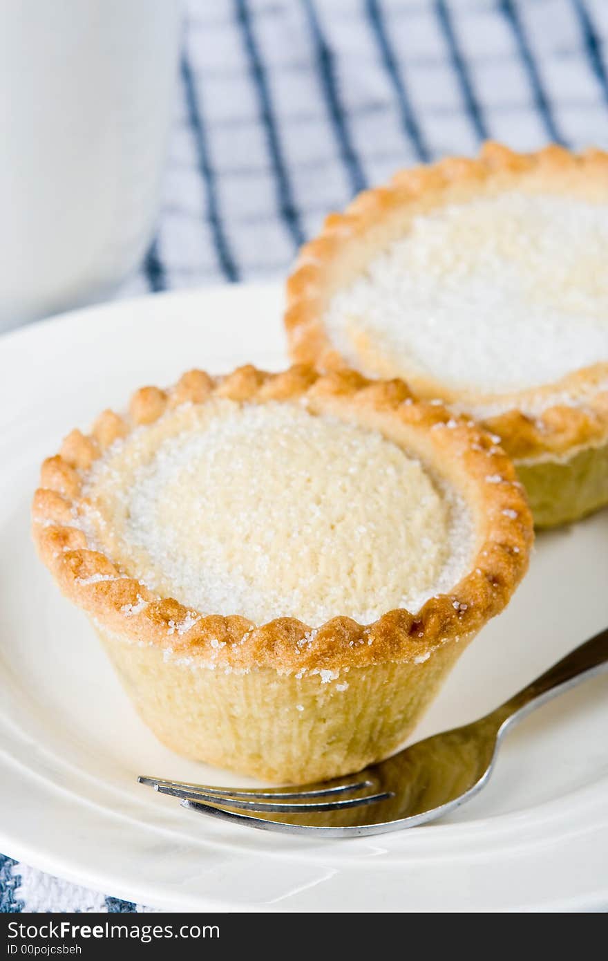 Two mince pies on a plate