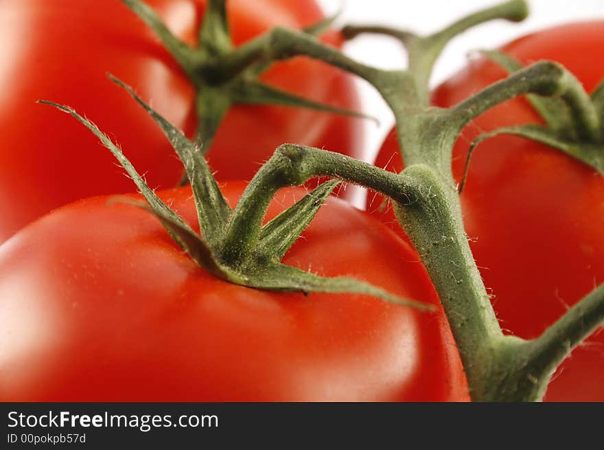 Red juicy tomatoes close-up