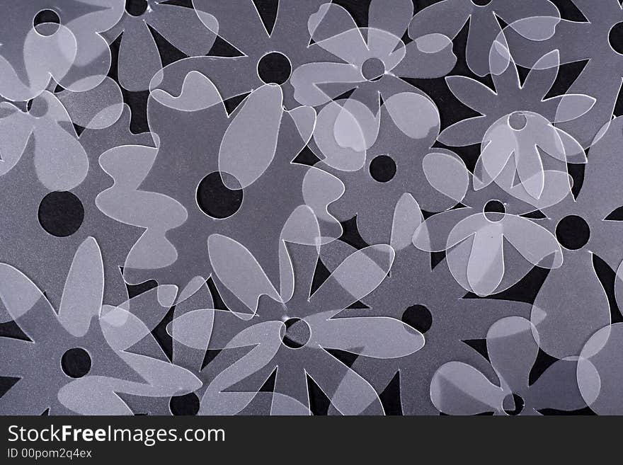 Plastic flowers on a black background. Plastic flowers on a black background