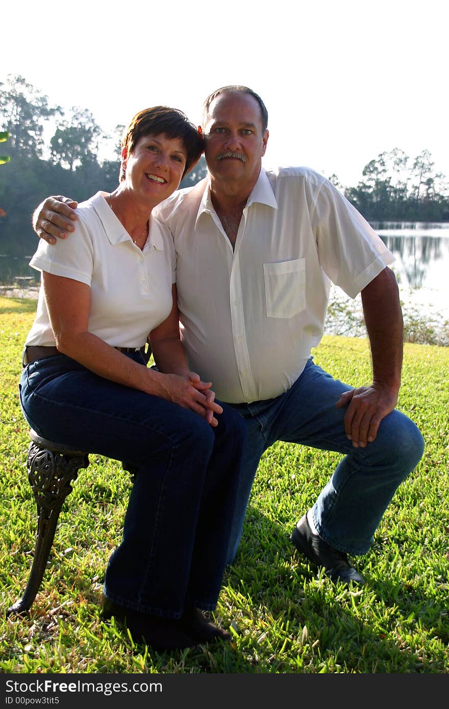 Adult Caucasian male and female siblings outside in casual clothing. Adult Caucasian male and female siblings outside in casual clothing