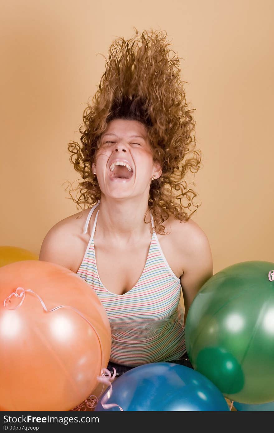 Attractive woman with balloons. Close-up portrait.