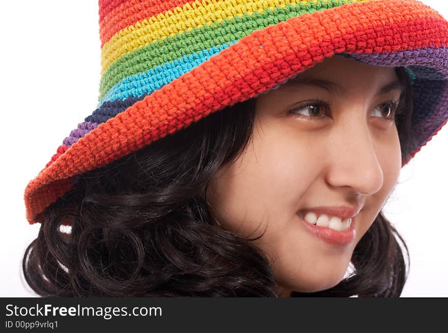 Stunning young lady wearing a summer hat