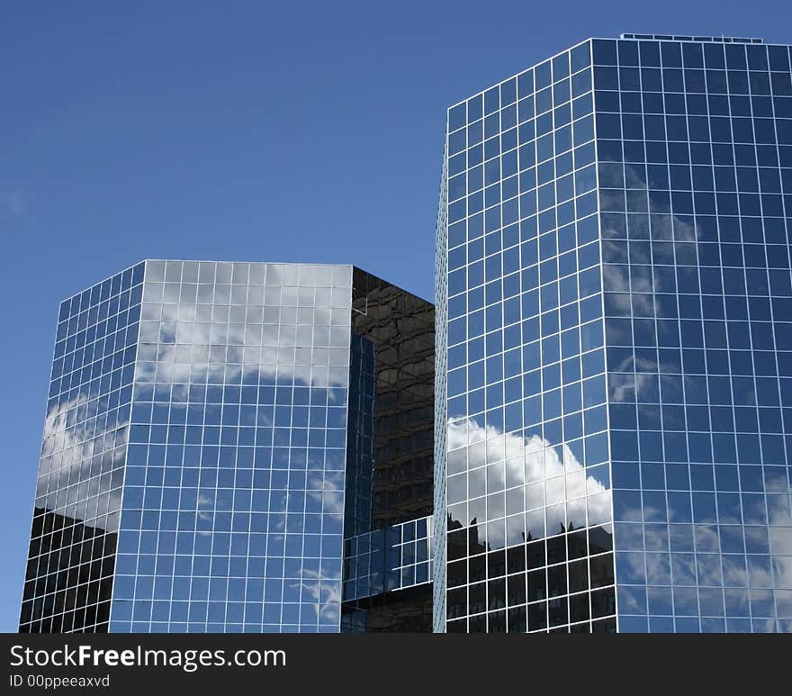 Mirrored Skyscrapers With Bridge