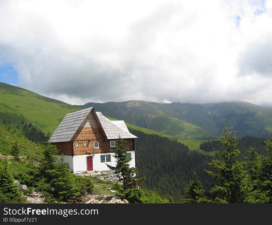 Parang Mountain in Romania House Clouds & skies nature country house trees padure. Parang Mountain in Romania House Clouds & skies nature country house trees padure