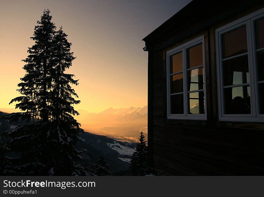 A shot in the alps with a beutiful sky and an alpine restaurant. A shot in the alps with a beutiful sky and an alpine restaurant.