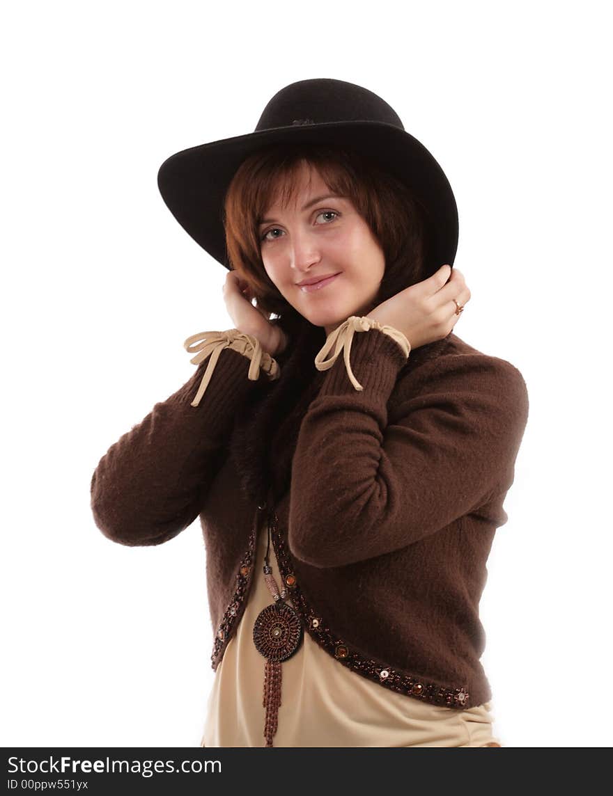 Portrait of the beautiful girl in a hat