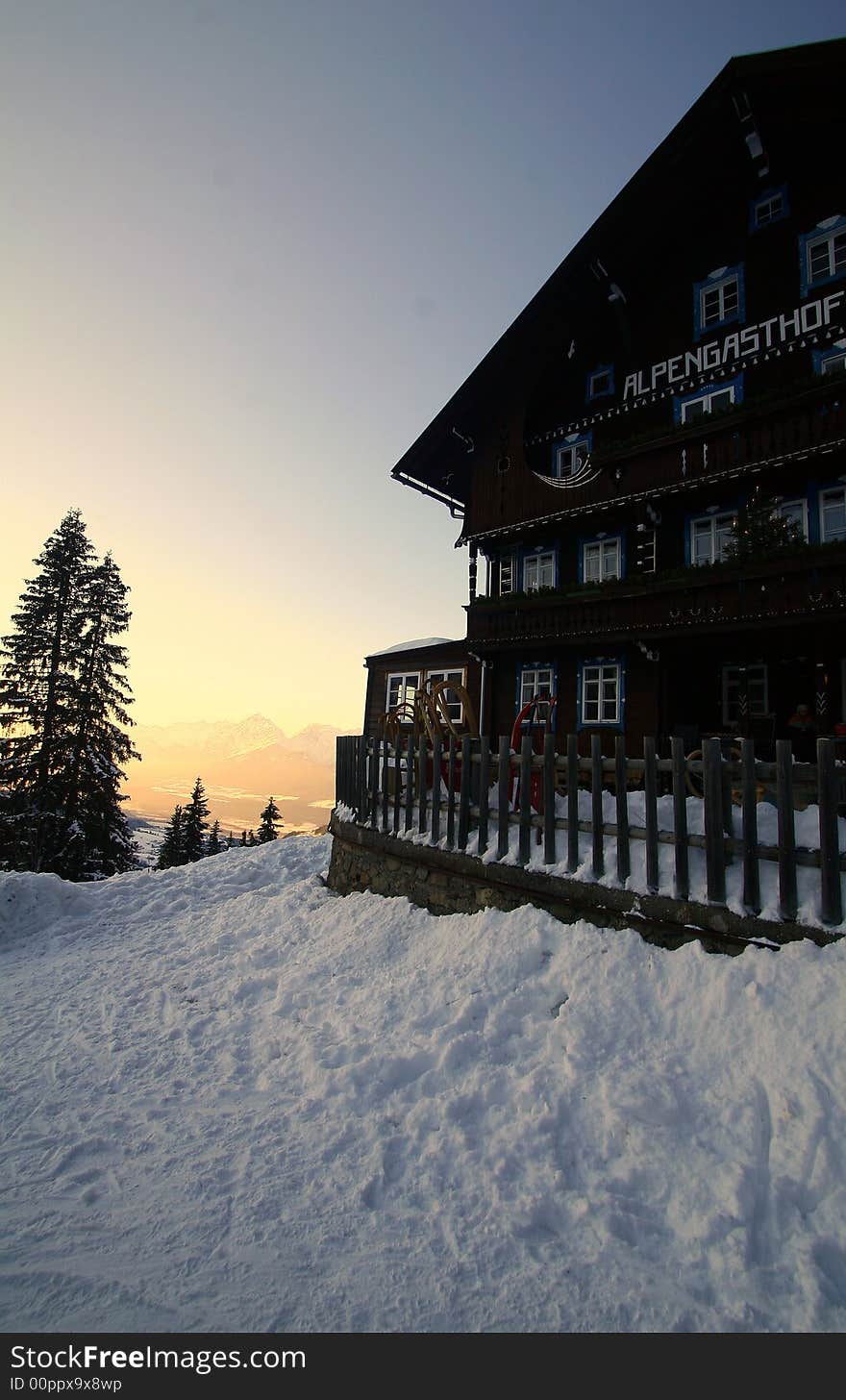 A shot in the alps with a beutiful sky and an alpine restaurant. A shot in the alps with a beutiful sky and an alpine restaurant.