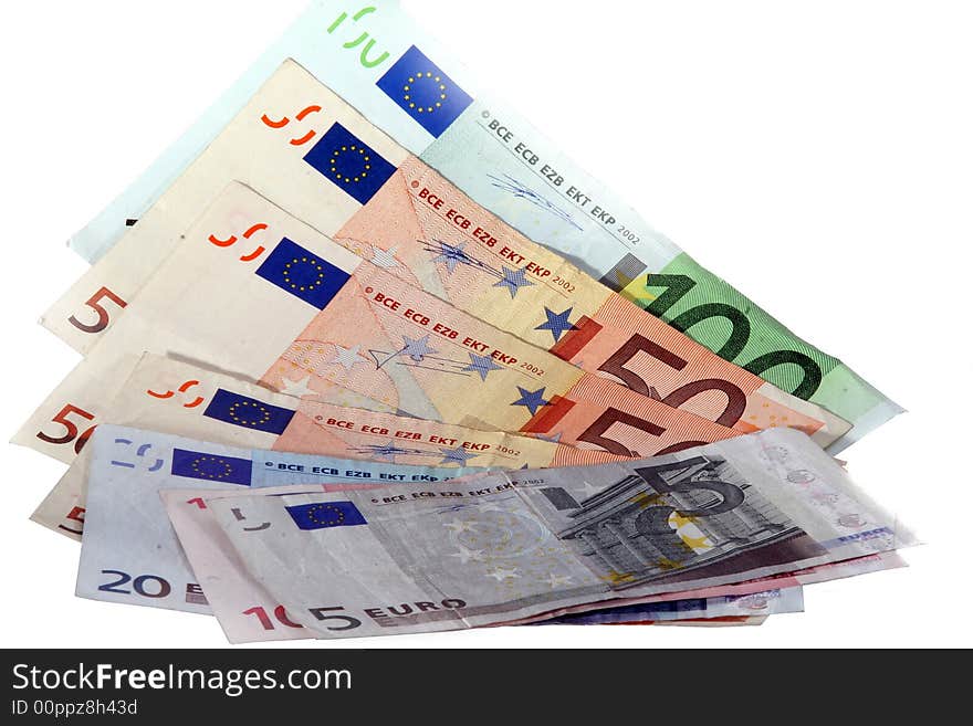 An isolated shot of Euro banknotes in all sizes. A lot of white space for text. An isolated shot of Euro banknotes in all sizes. A lot of white space for text.