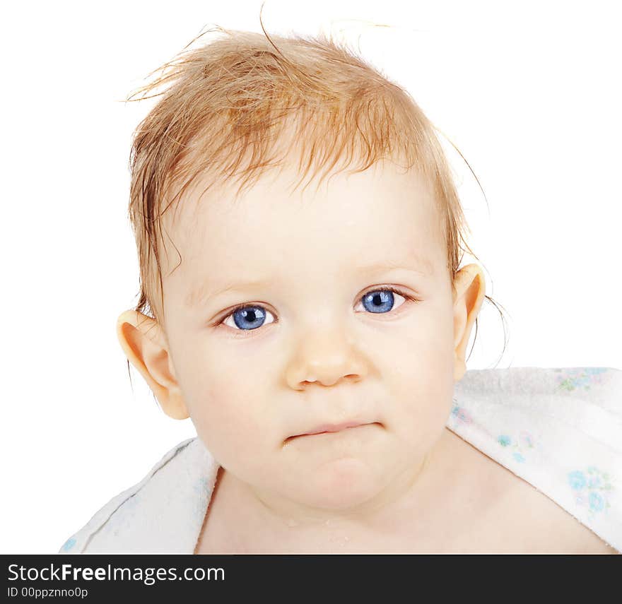 Portrait of the blue-eyed boy after a bath