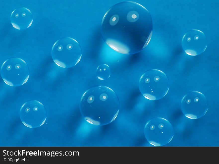 Macro shot of beautiful green water drops