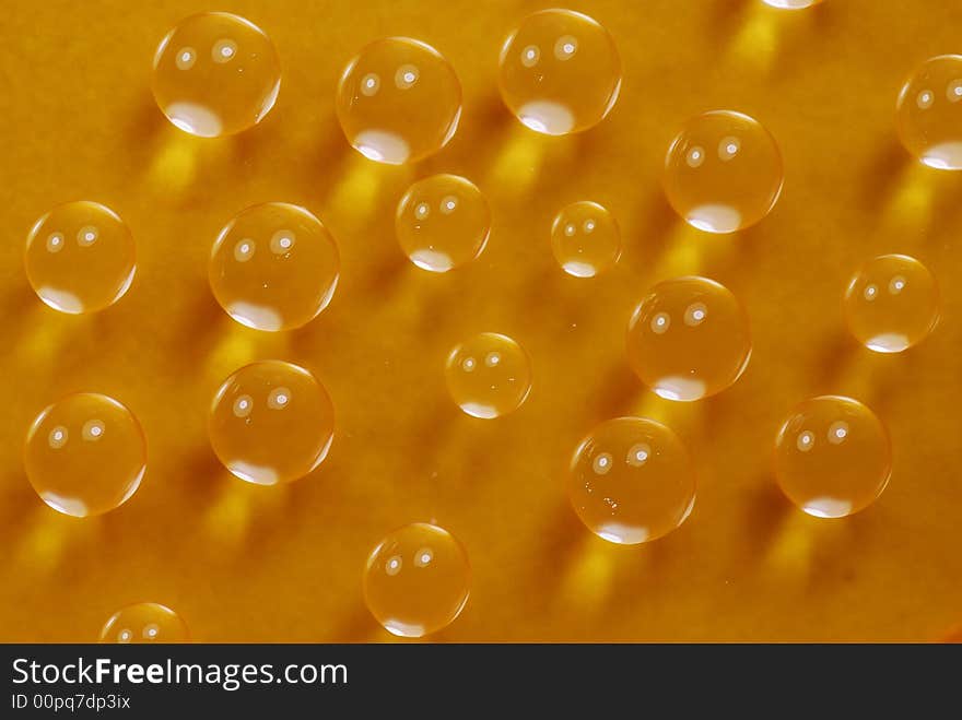 Macro shot of beautiful green water drops