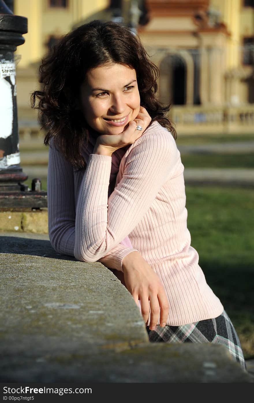 A beautiful brunette outdoor smiling