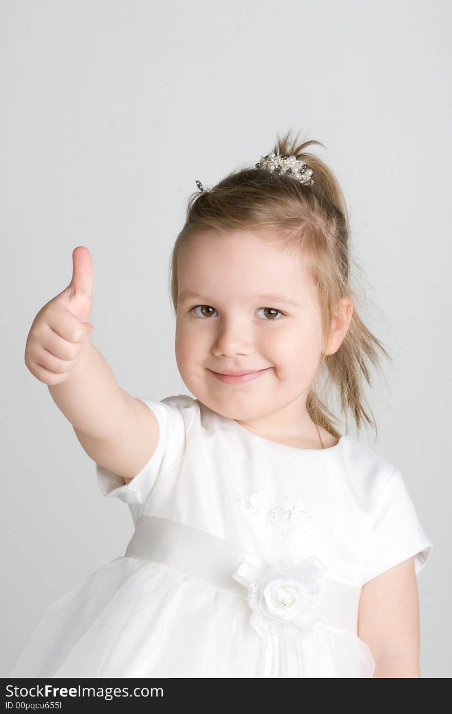 Happy little girl thumbs up